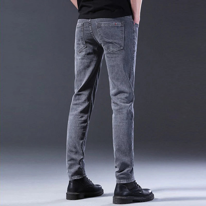 Men New Fashion Comfortable Slim Fit Jeans Male Loose Straight Smart Casual Denim Pants Formal Elasticity Look Taller Trousers.