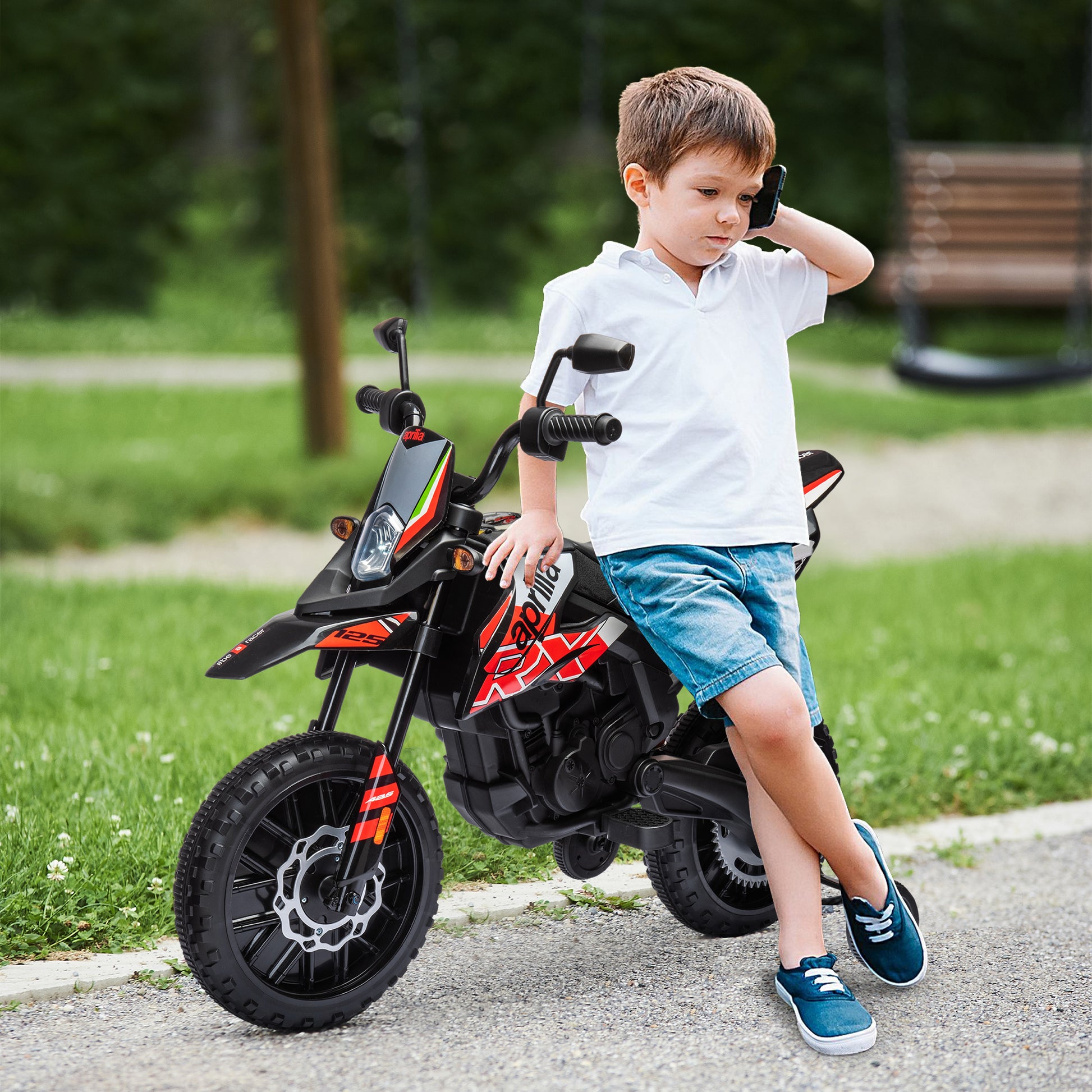Aiyaplay Electric Motorcycle for Children 12V with Aprilia License, Children's Electric Motorcycle with Detachable Auxiliary Wheels, 6 Km/H, Rear Suspension, Headlight, Music and Usb, for Children 37-96 Months, Red.