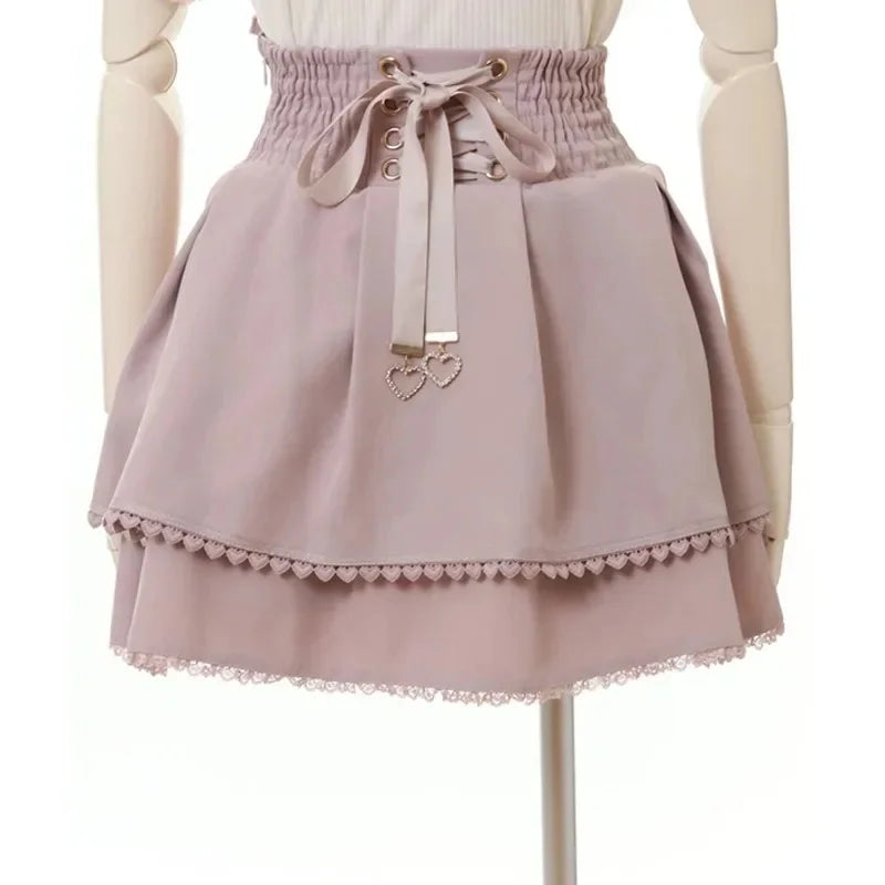 Japan Style High Waist Pleated Mini Skirts Bow Knot Design Mini Skirts Kawaii Slim Fit A-line Skirts Pink Lace Skirts For Women.