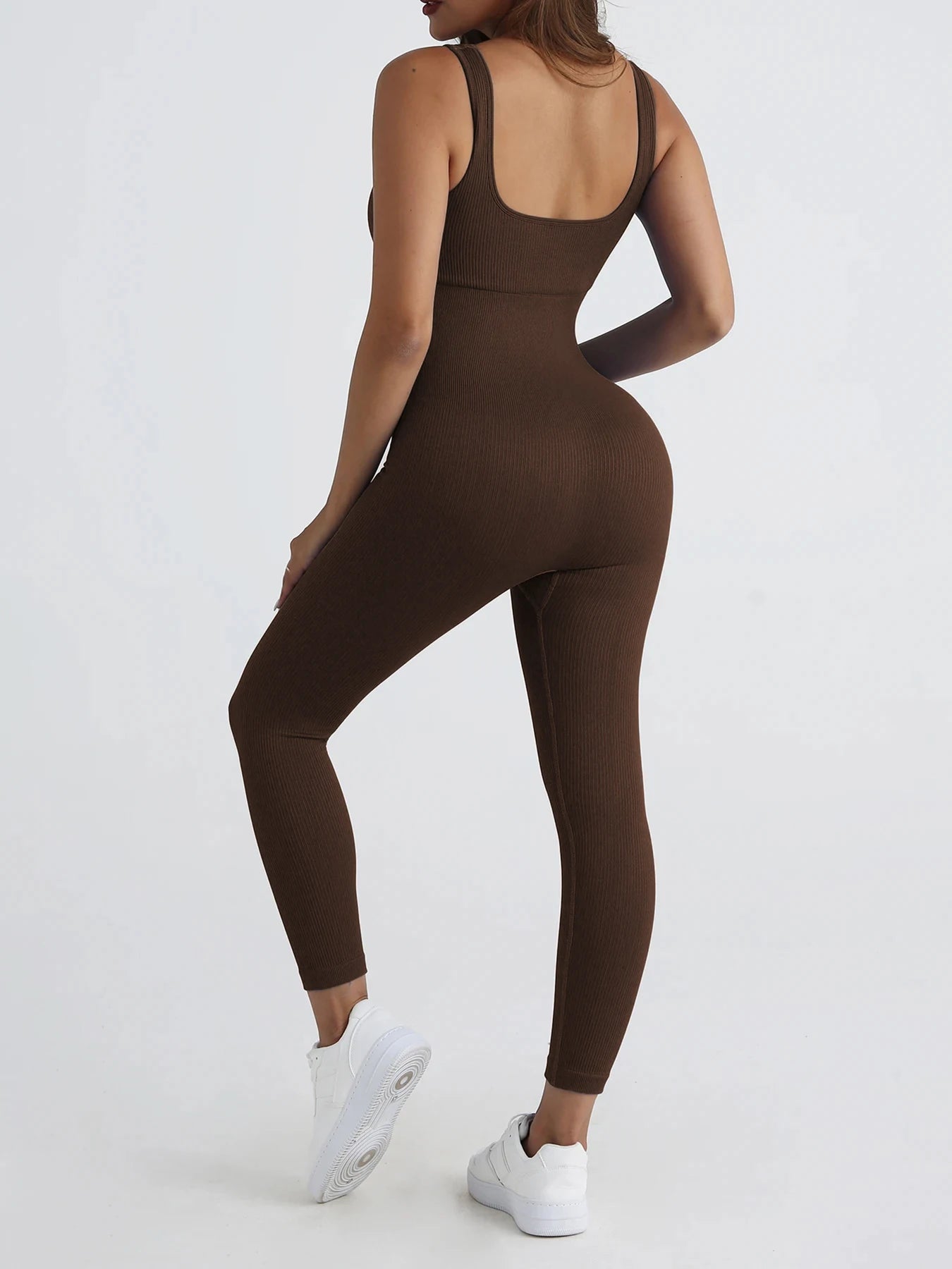 Women's jumpsuit yoga ribbed bodysuit seamless square neck leggings for sports and fitness.