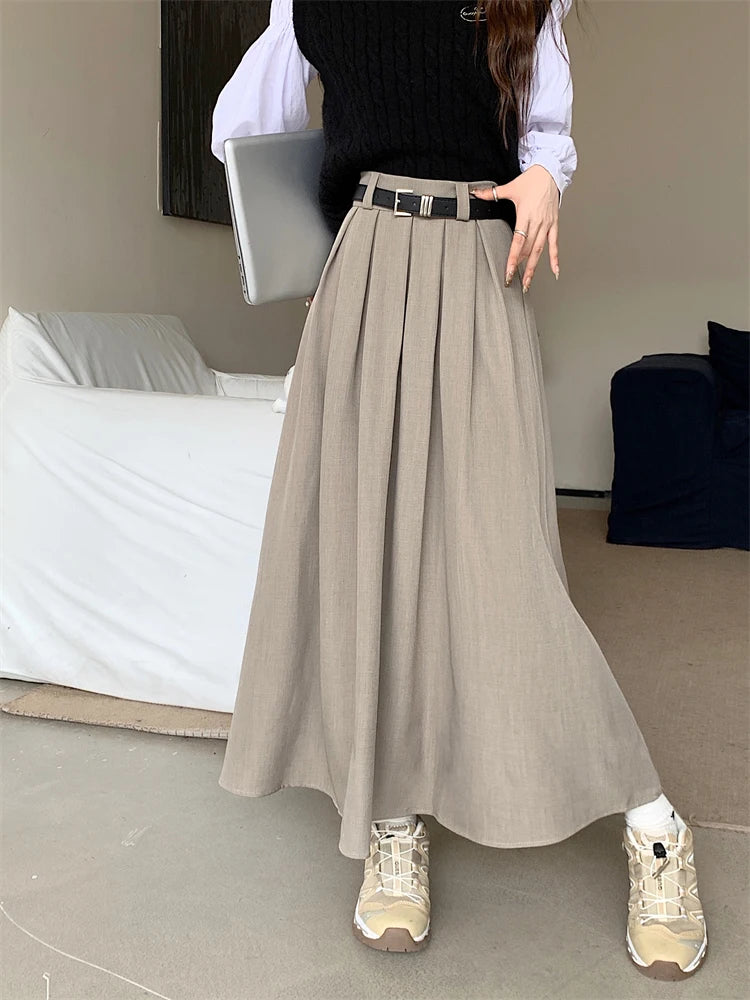 2024 New Korean Skirt Women Solid Color Versatile Mid-length Pleated Skirt Large Swing Type Skirt Female Long Skirts for Women.