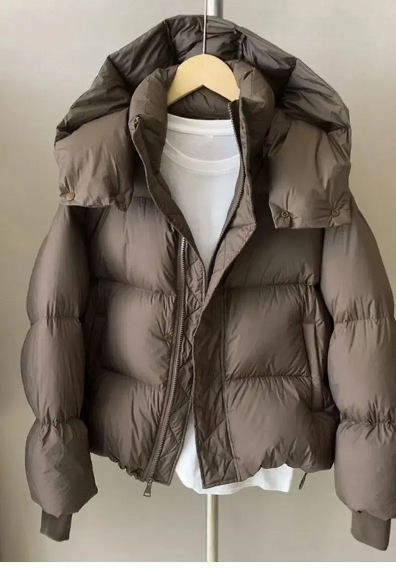 2023 neue Winter Puffer Jacke Frauen Mode Mit Kapuze Unten Baumwolle Mantel Weibliche Lose Beiläufige Warme Parkas Oberbekleidung.