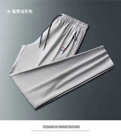 Men's Quick Dry Loose Fit Breathable Summer Lightweight Casual Pants Korean Style Elastic Sweatpants For Men.