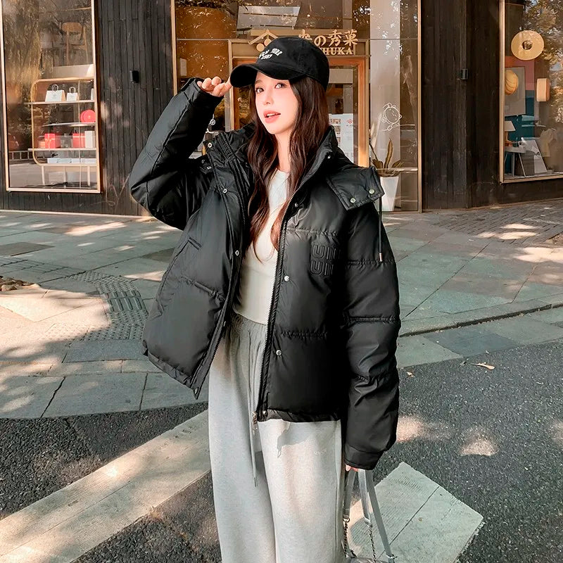 2024 Winter Neue frauen Unten Baumwolle Gefütterte Jacken Stilvolle Mit Kapuze Einfarbig Casual Verdicken Warme Lose anliegende kurze Mäntel