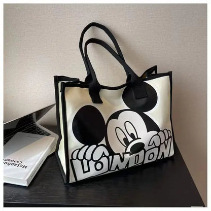 New Disney  Mickey Canvas Bag Women's Versatile Casual Shoulder Bag Commuter Handbag Large Capacity Multifunctional Mommy Bag.