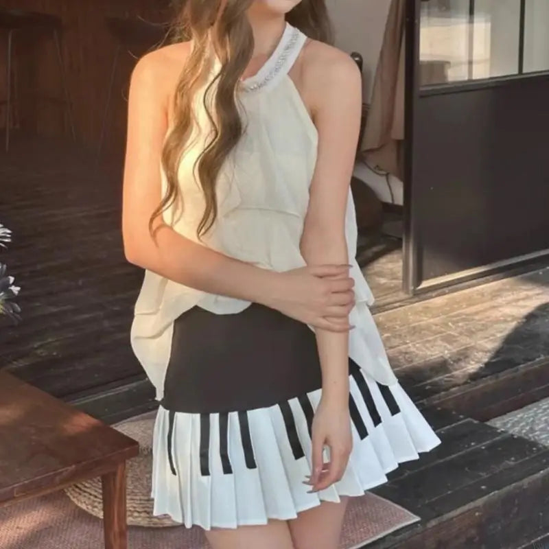 Y3NE Women Schoolgirl High Waist Pleated Flared Vintage Piano Print A Line Mini Skirt.