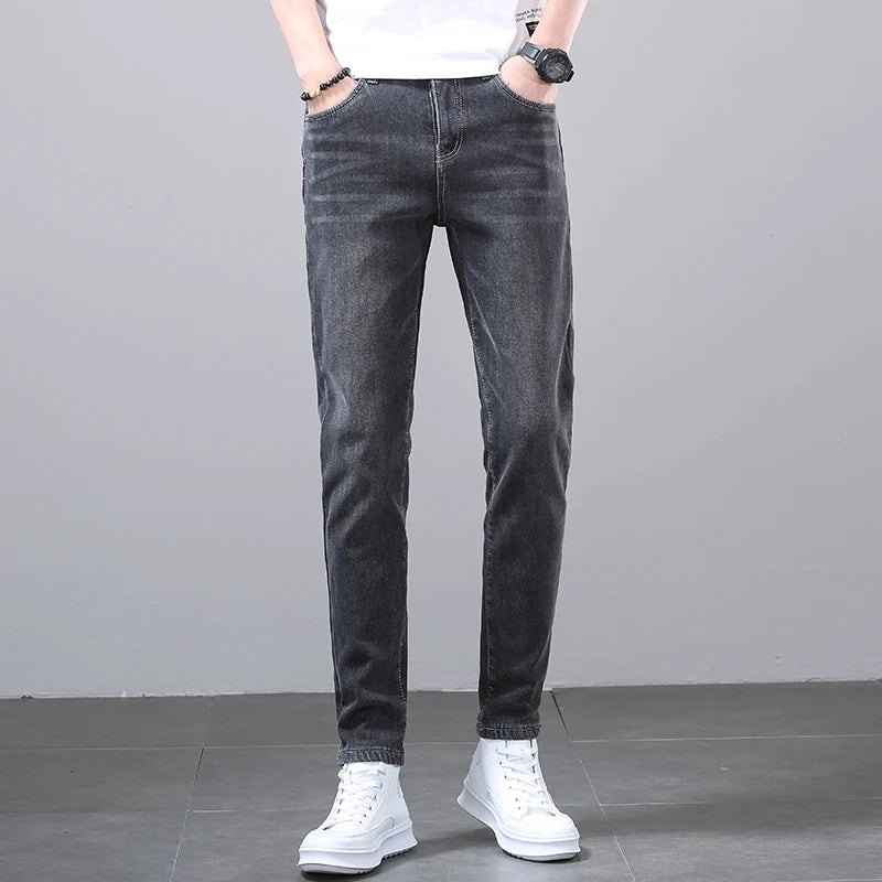New Men's Four Seasons Business Jeans Fashionable Slim Fit Micro Elastic Straight Leg Long Pants.