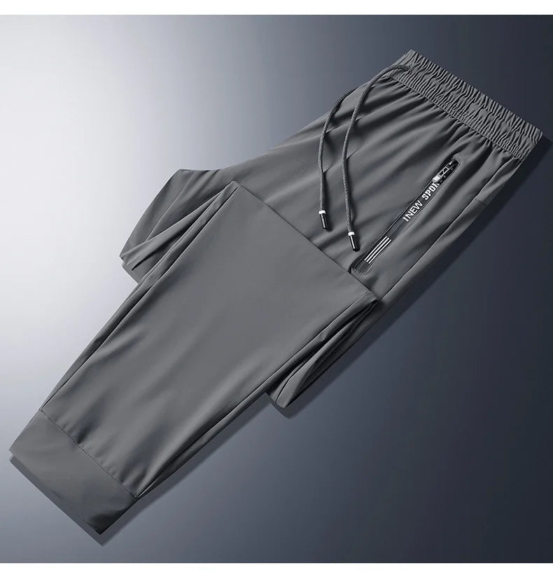 Men Summer Thin Ice Silk Pants Loose Style Workwear Casual Quick Dry Sports Pants Long Breathable High Elasticity.