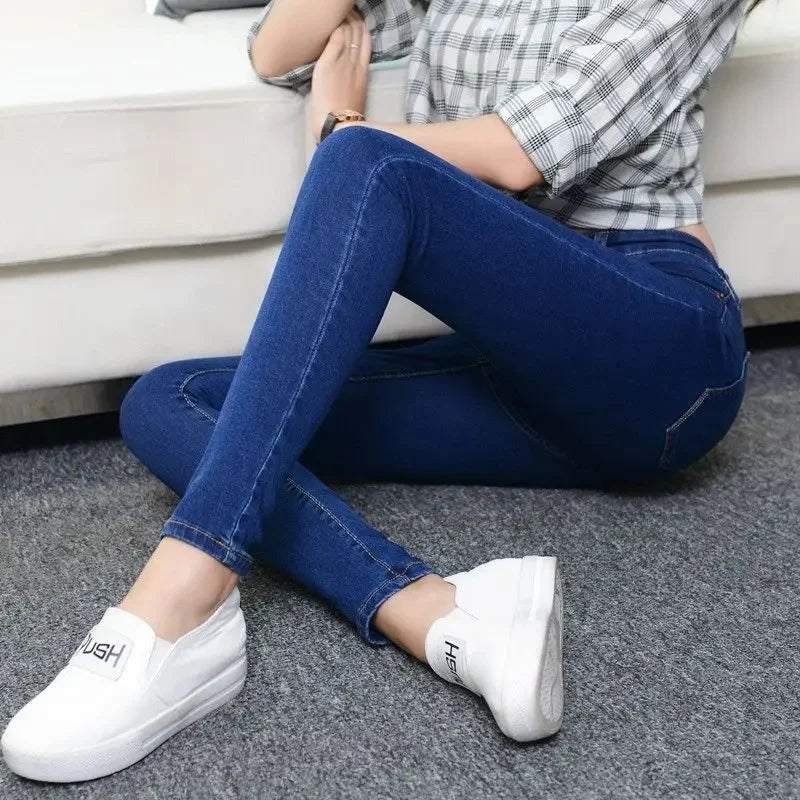 High Waist plus Size Denim Jeans Women's Fitting Pencil Pants Elastic Casual Long Trousers Light Blue Spring Autumn Wear.