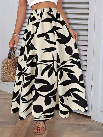 Fairyshely Casual Leaf Print Long Skirt For Women 2025 Summer Ruffle High Waist Maxi Skirt Ladies Elegant A line Pleated Skirt.