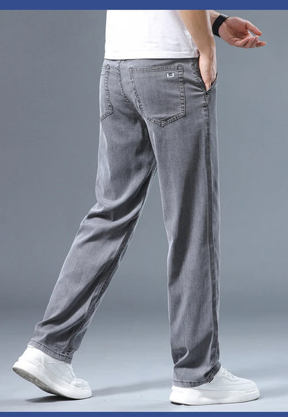 Summer Thin Men's Loose Straight Jeans Lyocell Soft Drape Business Casual Trousers Classic Smoke Gray Brand Ice Silk Pants.