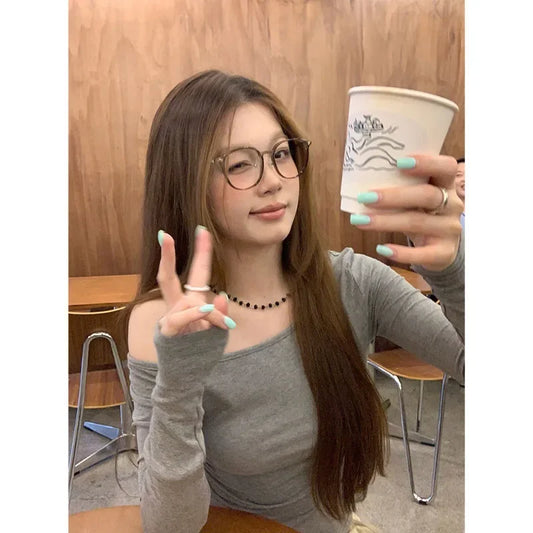 Spicy Girl Diagonal Shoulder Long Sleeve Women's T-shirt Base Layer Shirt Waist Inward Design Polo Collar Top.