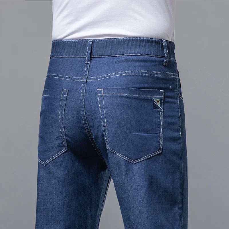 Summer Ultra Thin Men's Loose Jeans Lyocell Ice Silk Fashion Casual Business Denim Pants Straight Stretch Male Trousers