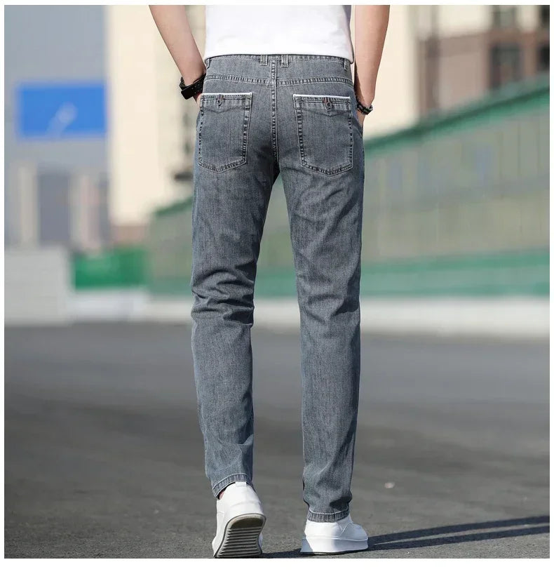 2025 sommer Neue männer Lose Grau Jeans Mode Lässig Stretch Gerade bein Denim Hosen Männlich Hellblau männer Hosen.