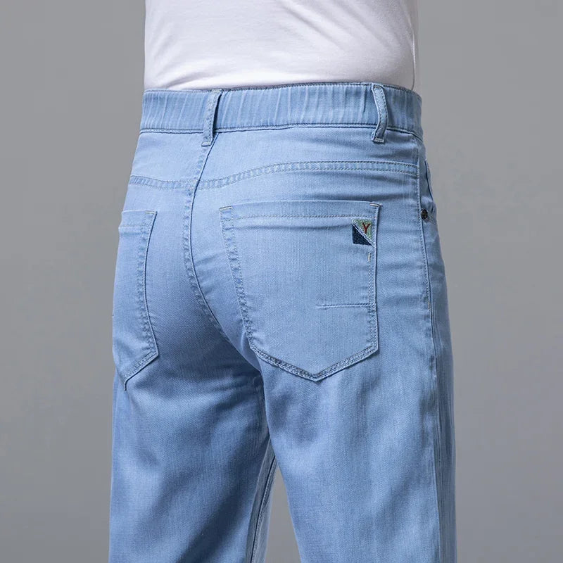 Summer Ultra Thin Men's Loose Jeans Lyocell Ice Silk Fashion Casual Business Denim Pants Straight Stretch Male Trousers