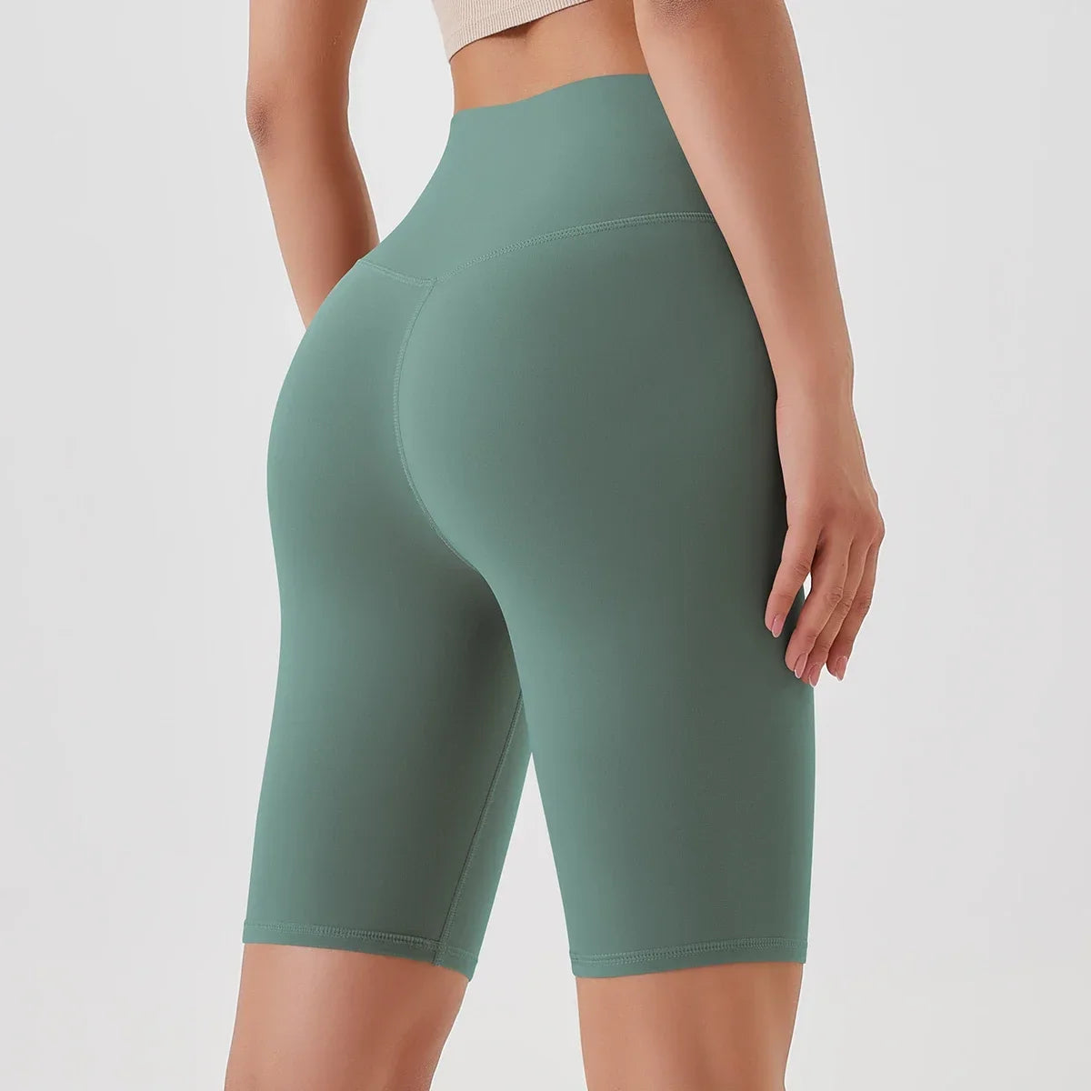 2024 High-Waisted Buttock Lifting Yoga Shorts Summer Seamless Yoga Legging Shorts Outer Wear Tight Cycling Athletic Gym Shorts.
