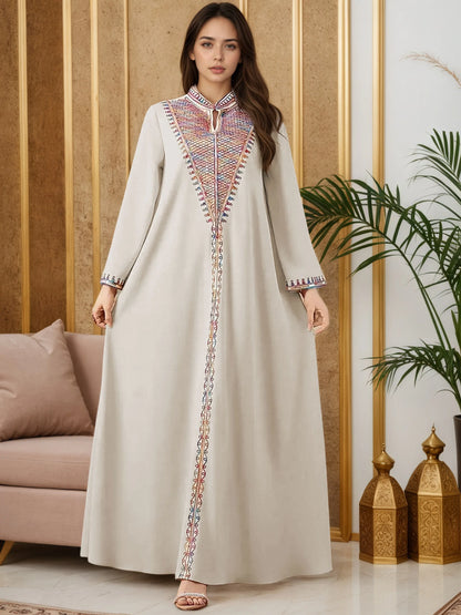 2025 New Luxury Muslim Abaya Off White Intricate Colorful Embroidery Detailing Ideal for Saudi Arabian Formal Gatherings Islam.