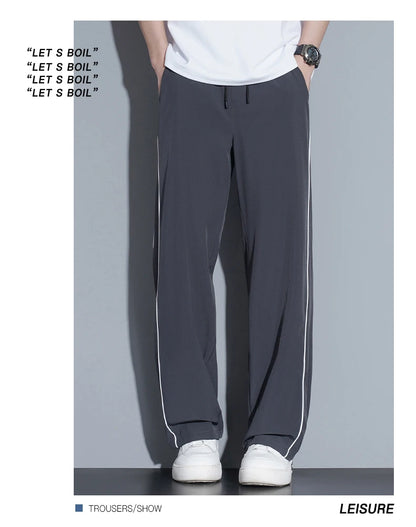 Summer ice silk thin section pants men's Hong Kong style loose splicing casual sports wide-legged pants elastic speed pants