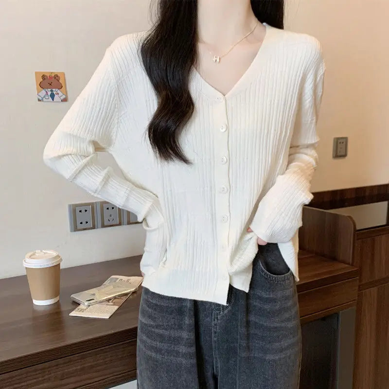 Women's Long-sleeved Button Cardigan Solid Color Casual Loose Fashion Top.