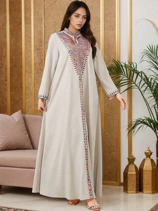 2025 New Luxury Muslim Abaya Off White Intricate Colorful Embroidery Detailing Ideal for Saudi Arabian Formal Gatherings Islam.