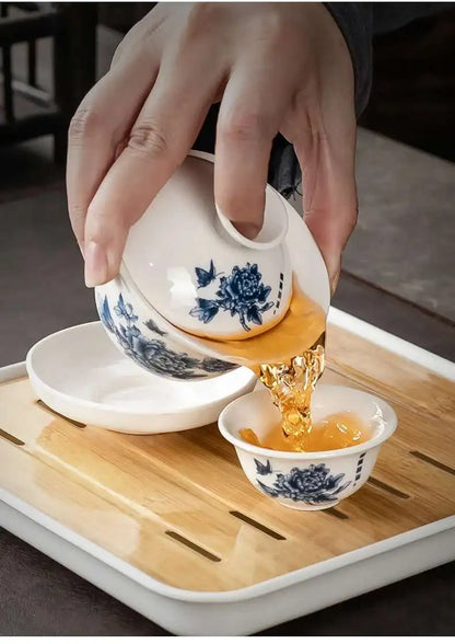 1 gaiwan 4 cups 1 teaboad Ceramic kungfu tea set household  one cover bowl four cups living room kungfu office reception.