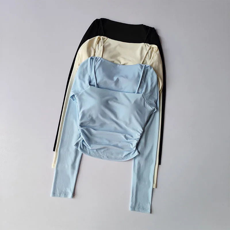 Yoga Clothes Women Sports Tops Fixed Chest Pads Mesh Splicing Slimming Long Sleeves Fashionable Running Training Fitness Clothes.