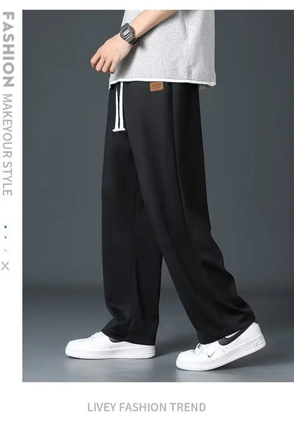 Casual long pants for boys, ice silk quick drying pants for spring and summer, thin, trendy brand straight tube, loose, hanging.