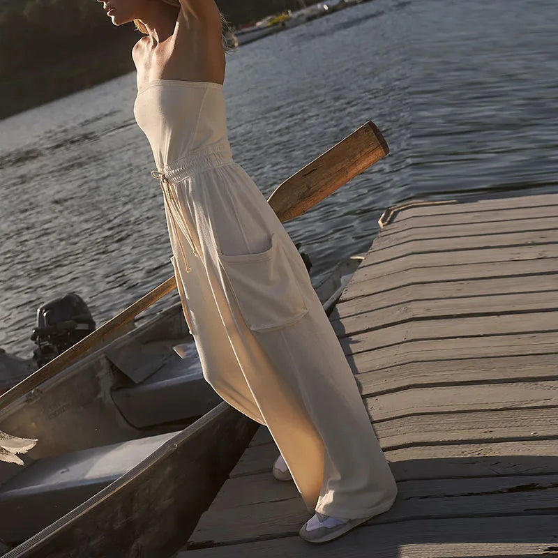 Stylish New Backless Sleeveless Commute Playsuits Women Tube Top Wide Leg Drawstring Rompers Elegant Solid Color Pocket Jumpsuit.