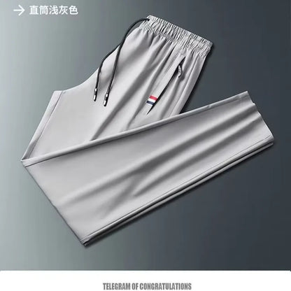 Men's Quick Dry Loose Fit Breathable Summer Lightweight Casual Pants Korean Style Elastic Sweatpants For Men.