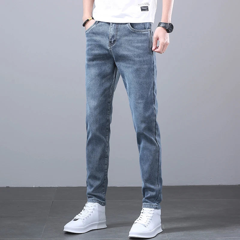 New Men's Four Seasons Business Jeans Fashionable Slim Fit Micro Elastic Straight Leg Long Pants.