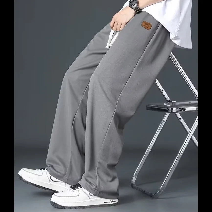 Casual long pants for boys, ice silk quick drying pants for spring and summer, thin, trendy brand straight tube, loose, hanging.