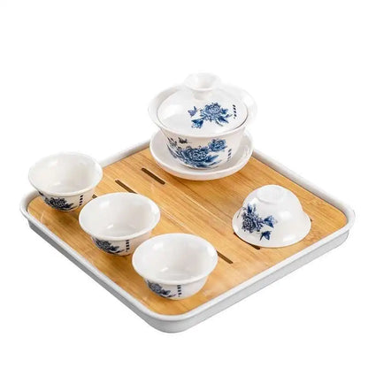 1 gaiwan 4 cups 1 teaboad Ceramic kungfu tea set household  one cover bowl four cups living room kungfu office reception.