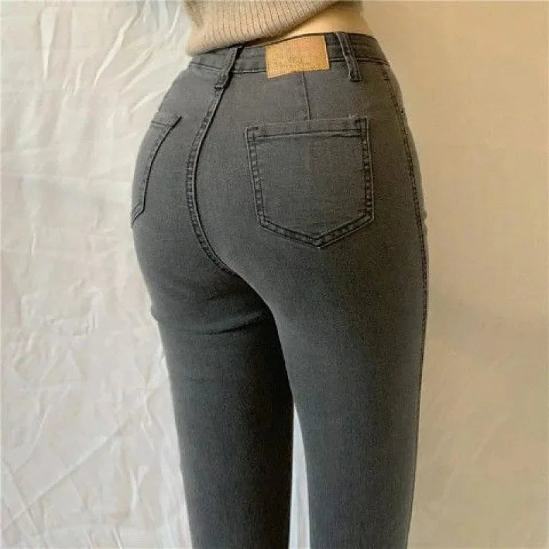 High Waist plus Size Denim Jeans Women's Fitting Pencil Pants Elastic Casual Long Trousers Light Blue Spring Autumn Wear.