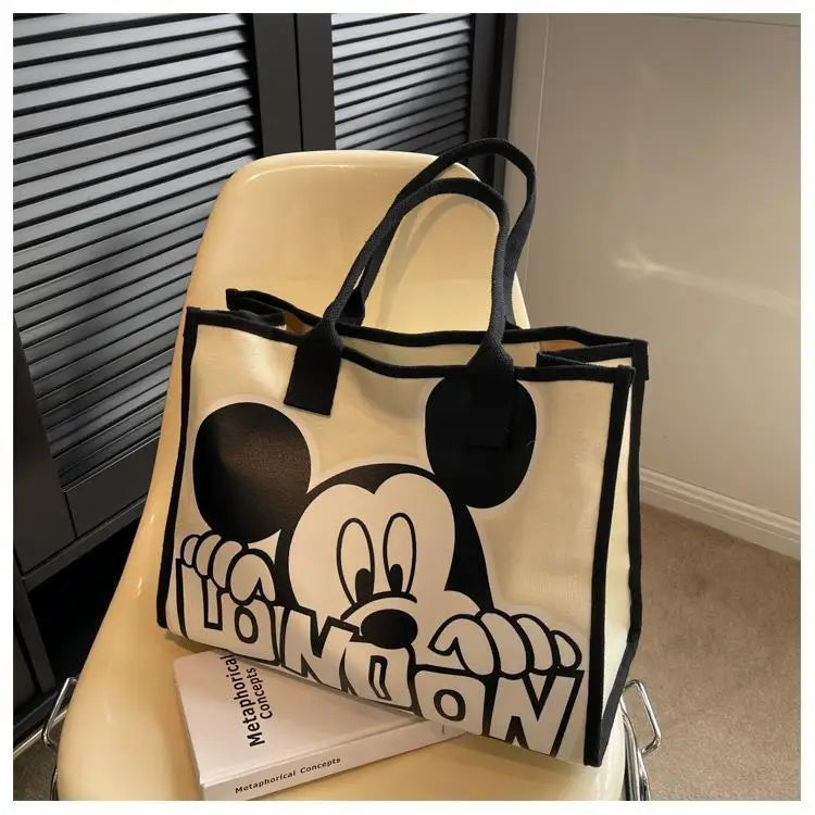 New Disney  Mickey Canvas Bag Women's Versatile Casual Shoulder Bag Commuter Handbag Large Capacity Multifunctional Mommy Bag.