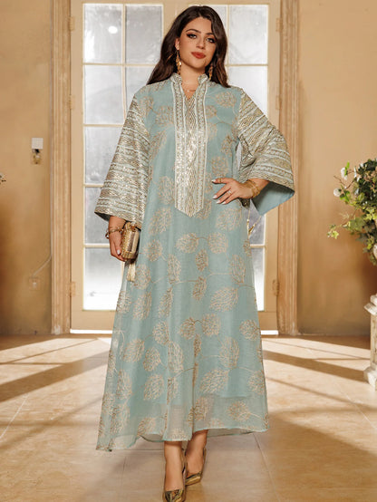 Muslim Women's Light Blue Islamic Embroidered Abaya with Gold Detailing Ideal for Formal Events in Middle East like UAE Saudi.