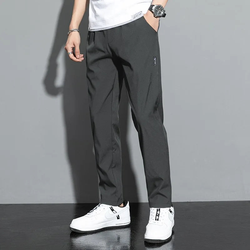 Ice Silk Men's Pants 2024 Summer New Black Gray Thin Business Casual Pants Outdoor Elastic Breathable Straight Leg Sweatpants.