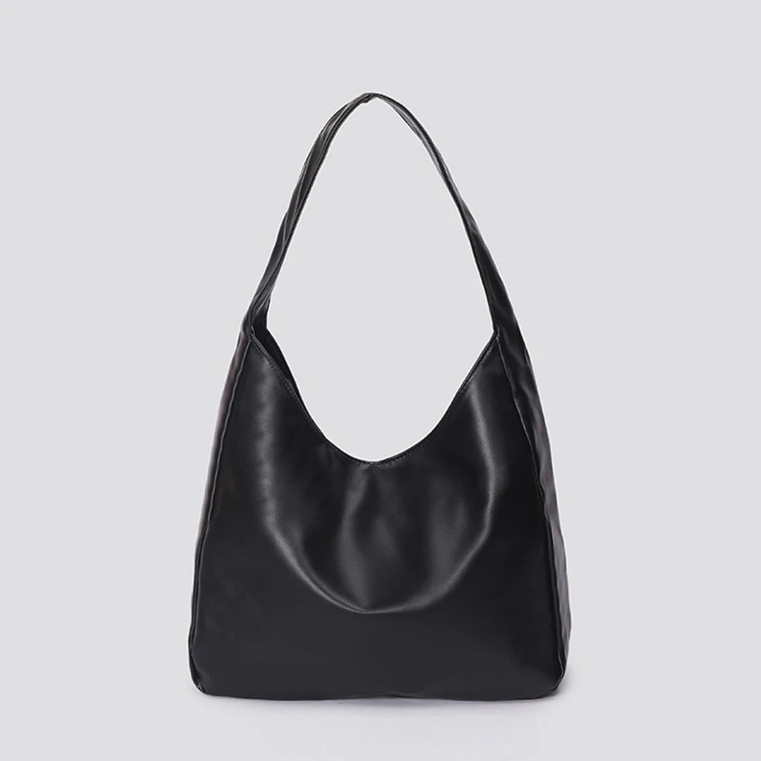 Large capacity tote bag, new black leather simple casual commuting women's bag, fashionable and versatile single shoulder bag.