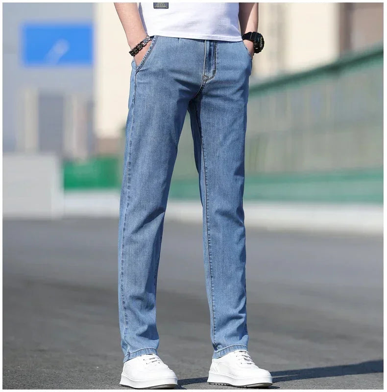 2025 sommer Neue männer Lose Grau Jeans Mode Lässig Stretch Gerade bein Denim Hosen Männlich Hellblau männer Hosen.