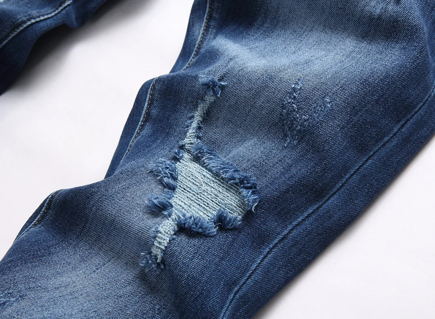 2025 Men's Ripped Jeans Luxury Brand Light Blue Holes Long Trousers Quality Male Fashion Stretch Slim Pants Men Skinny Jeans.