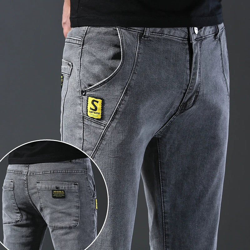 Men's slim fit Korean style comfortable straight leg elastic gray mid waist pants men's casual business jeans.