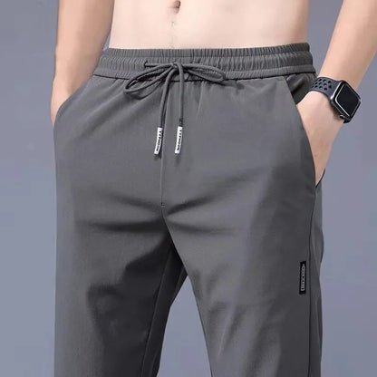 Ice Silk Men's Pants 2024 Summer New Black Gray Thin Business Casual Pants Outdoor Elastic Breathable Straight Leg Sweatpants.