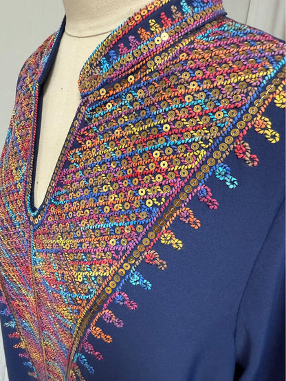 Trendy Muslim Abaya in Deep Blue Adorned with Intricate Multicolored Embroidery for Arabian Social Galas Modest Islam Fashion.