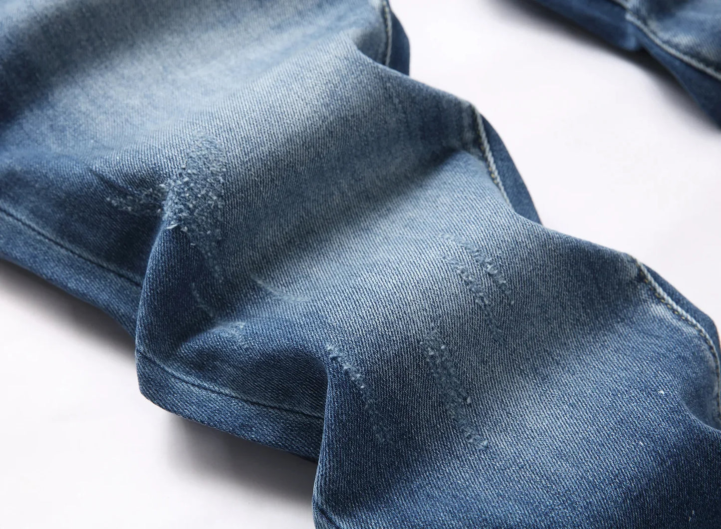 2025 Men's Ripped Jeans Luxury Brand Light Blue Holes Long Trousers Quality Male Fashion Stretch Slim Pants Men Skinny Jeans.