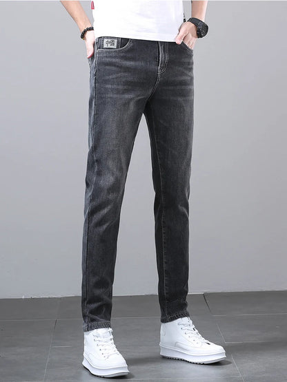 New Men's Four Seasons Business Jeans Fashionable Slim Fit Micro Elastic Straight Leg Long Pants.