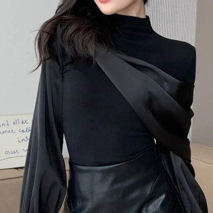 Long-sleeved shirt women's 2024 spring and autumn new light luxury fashion splicing design sense niche temperament versatile top.