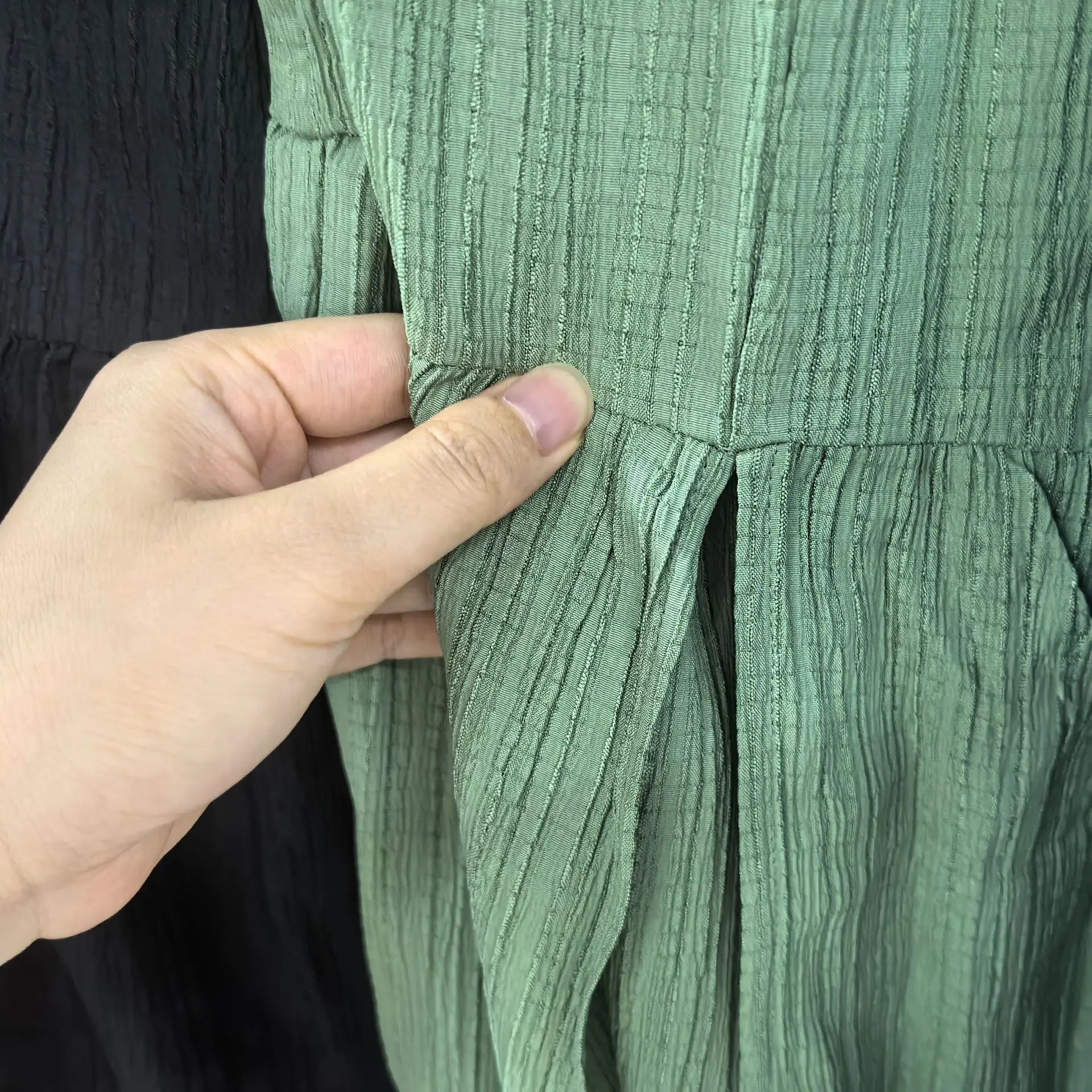 Fairyshely Casual Green Split Long Skirt Women 2025 Summer Ruffle High Waist Midi Skirt Lady Elegant Solid A line Pleated Skirt.