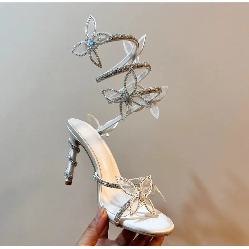 Luxury Crystal Embellished Butterfly Detail Women Sandals Sexy Coiled Strap Thin High heels Gladiator sandals Summer Party Shoes.