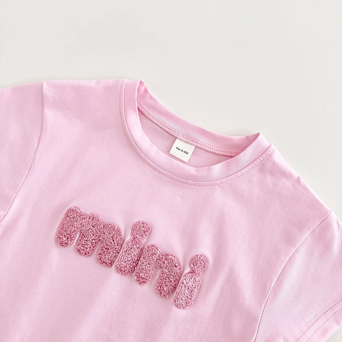 INS Sommer Neue Baby Body Neugeborenen Kleidung Jungen Mädchen Baumwolle Dreieck Strampler Plüsch brief Kurzarm Infant 0-18M