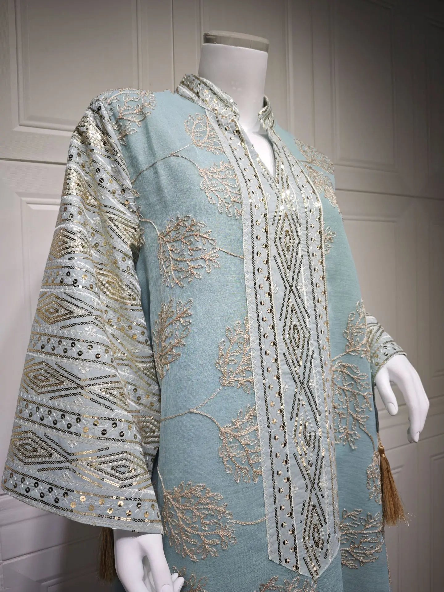 Muslim Women's Light Blue Islamic Embroidered Abaya with Gold Detailing Ideal for Formal Events in Middle East like UAE Saudi