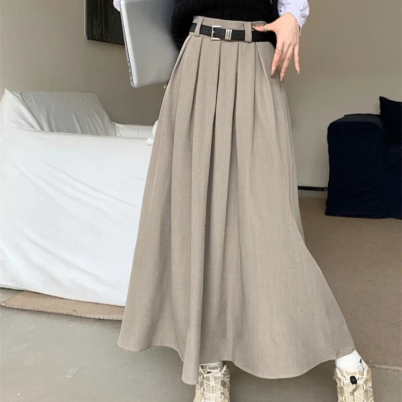 2024 New Korean Skirt Women Solid Color Versatile Mid-length Pleated Skirt Large Swing Type Skirt Female Long Skirts for Women.